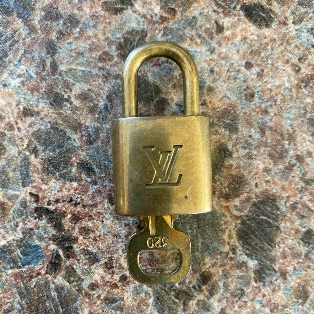 Louis Vuitton authentic lock and key LV